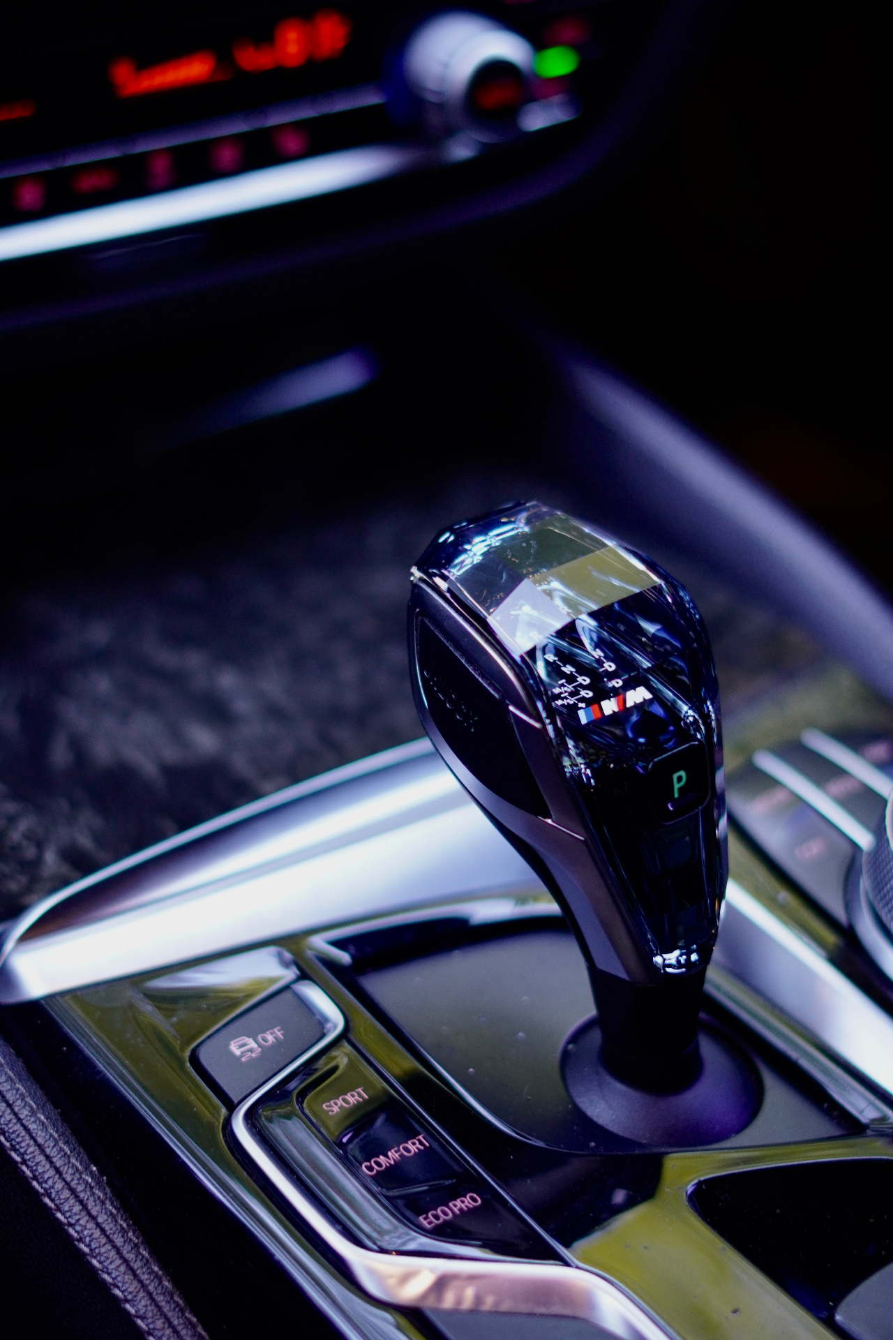Detailed BMW M interior with polished crystal gear shifter